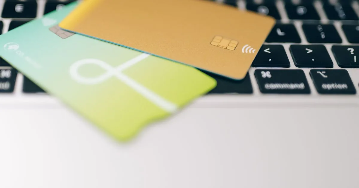 How we review credit cards in Canada, cards on a laptop keyboard